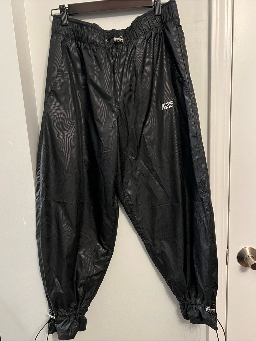 Nike Women’s Black Jogger Track Pants with Drawcord Ankles; size M